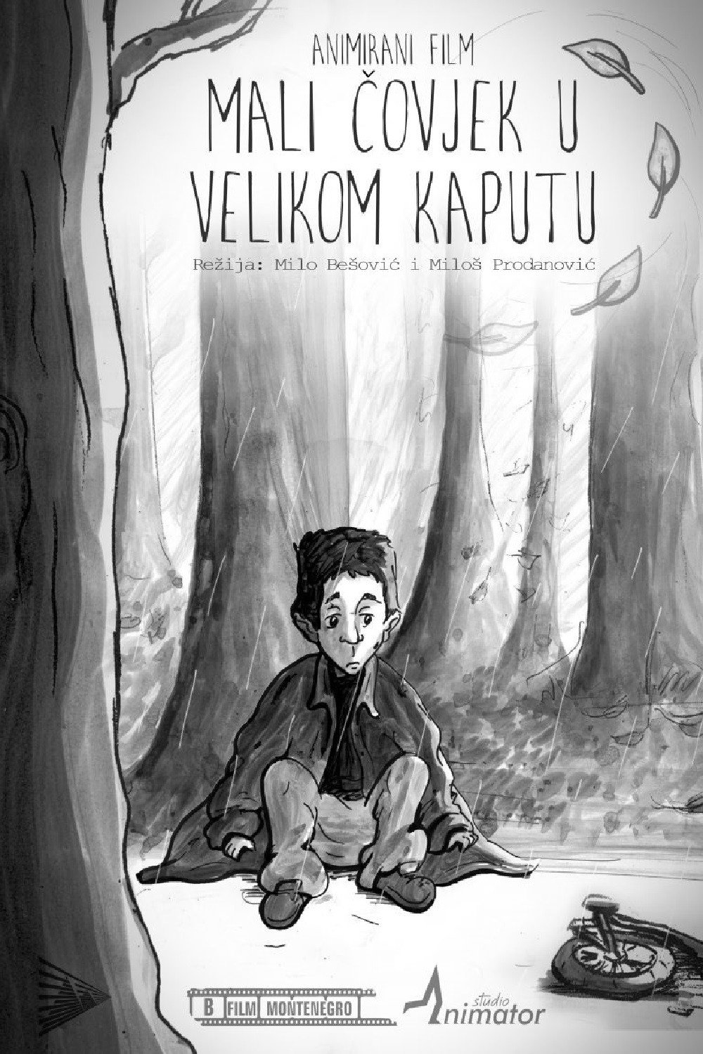 Mali čovjek u velikom kaputu