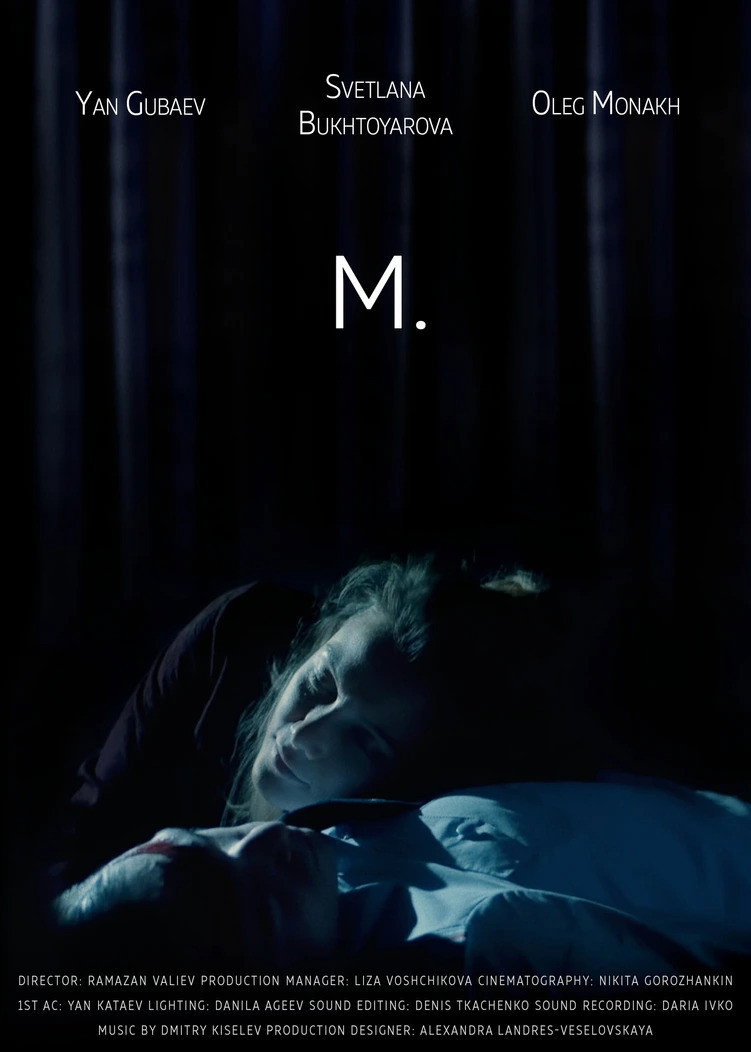 M.